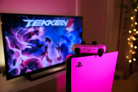 New Tekken 8 Sony PS5 console. Dualsense controller. Man holding joystick and ready to play upcoming Tekken 8