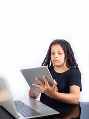Teenage Brazilian woman using technology, white background, selective focus.
