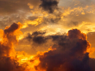 Fototapeta premium Dramatic variegated cloudscape at sunset early in June, southwest Florida, for motifs of transition and change