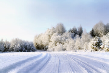 Fototapeta na wymiar - 9. Latvian white winter landscape with country road