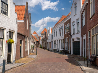 Fototapeta na wymiar Streetscene of Lange Sint Janstraat in Zierikzee, Schouwen-Duiveland, Zeeland, Netherlands