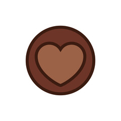 Chocolate heart in a round frame. A piece of chocolate with a heart inside.