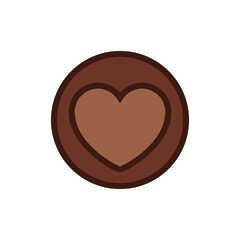Chocolate heart in a round frame. A piece of chocolate with a heart inside.