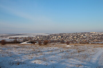 A snowy landscape with a rainbow