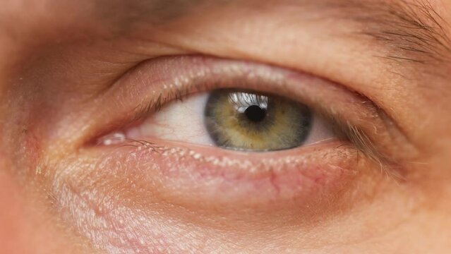 close up macro eye opening human healthy eyesight awareness concept.