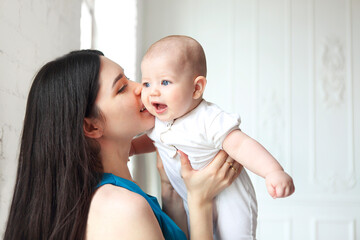 Mother holding sweet baby boy