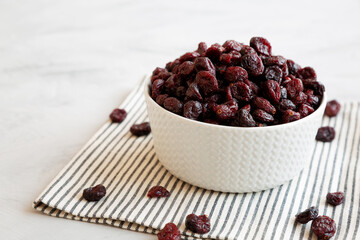 Organic Dried Cranberries in a Bowl, low angle view.
