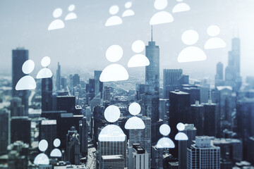 Double exposure of abstract virtual social network icons on Chicago city skyscrapers background....