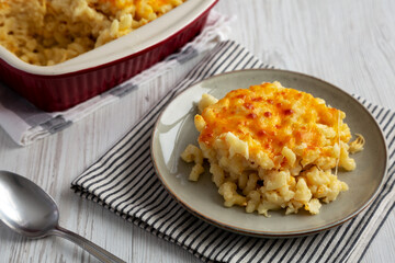 Homemade Baked Mac and Cheese on a Plate, side view.