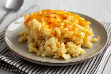 Homemade Baked Mac and Cheese on a Plate, side view.