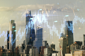 Fototapeta na wymiar Double exposure of abstract creative financial chart hologram and world map on New York city skyscrapers background, research and strategy concept