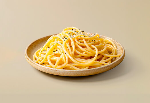 Caci e pepe spaghetti on a plate isolated on a beige background