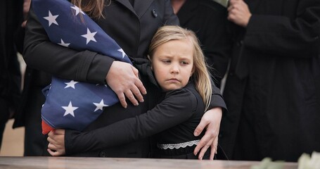 USA veteran funeral, girl and sad family with hug, care and flag for mourning, depression and comfort with mom. Kid, people and service with coffin, burial or memorial with war hero in Philadelphia - obrazy, fototapety, plakaty