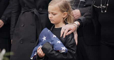 Funeral, cemetery and girl with American flag for veteran for respect, ceremony and memorial...