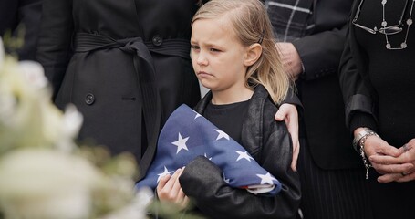 Funeral, cemetery and child with American flag for veteran for respect, ceremony and memorial...