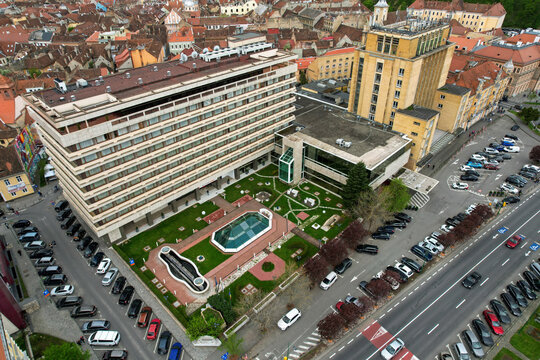 BRAȘOV, ROMANIA – May 1, 2022: An aerial view of the Aro Palace Hotel, a 5-star venue positioned in Brașov 's old city center, nearby Council Square, revealing its architectural features.