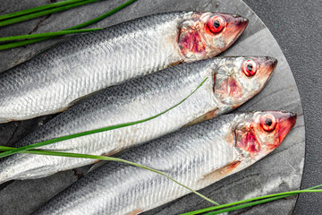 herring fish fresh raw seafood tasty fresh healthy eating cooking appetizer meal food snack on the...