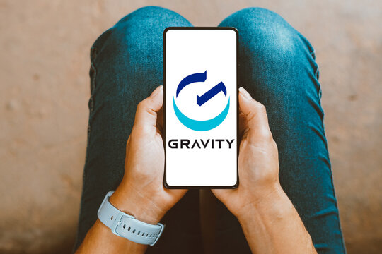 January 22, 2024, Brazil. In this photo illustration, the GRAVITY Co., Ltd. logo is displayed on a smartphone screen.