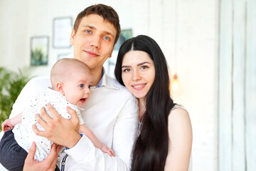 Young family with little son at home