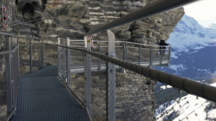 Grindelwald First Mountain Trail - Elevated Metal Pathway Along Cliffside