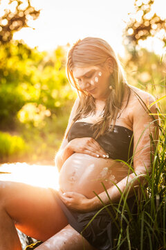 Pregnant First nations Australian woman on country in NSW Australia