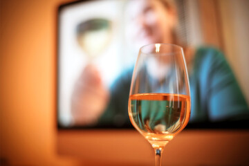 Glass of wine during online date