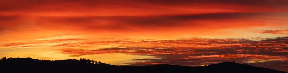 Tischdecke Alpenglow on sunset cloudy sky with black silhouette forest horizon. Czech panoramic landscape background © Space Creator