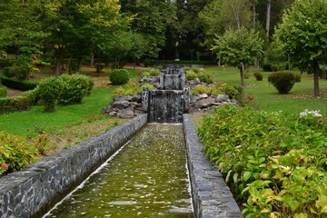 Fountain in the park. Beautiful landscaping in the garden