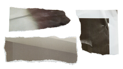 Torn black and gray magazine paper