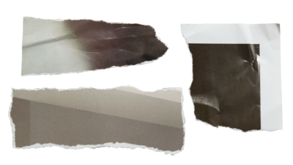 Torn black and gray magazine paper
