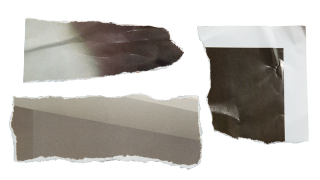 Torn black and gray magazine paper