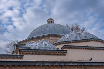 Fototapeta na wymiar Historical Turkish bath. Domes and stonewalls. Kilic Ali Pasa Hamami. Istanbul, Turkey.