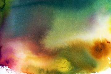 Watercolor background with colored spots.