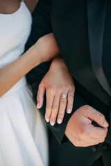 close up of a couple holding hands