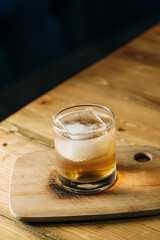 glass of beer on wooden table