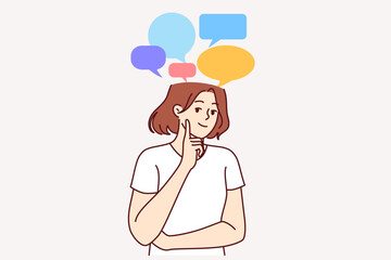 Thoughtful smiling woman coming up with graduation speech, standing with dialogue bubbles above head. Thoughtful girl with positive emotions recalls messages from friends on social networks