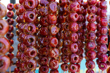 Tang hulu or Chinese sugar-coated fruit stick. The snack of China in the Winter