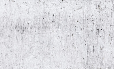 Dirty white concrete wall texture with scratches. Old rough white wall background. Grunge white wallpaper.