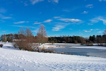 Pond in Bucks Mill Recreational area in Colt's Neck, New Jersey, on a cold, crisp, winter day, after some snowfall -03