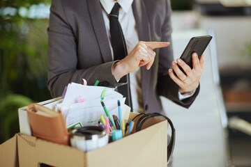 Modern 40 years old woman worker in green office