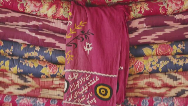 Bright Eastern blankets. Patchwork craftsmanship. Handicraft of Eastern cultures. 4K.