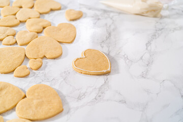 Heart-shaped sugar cookies with royal icing