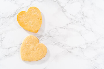 Heart-shaped sugar cookies with royal icing