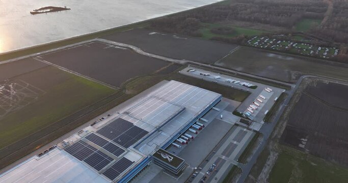 Distribution warehouse in Almere, The Netherlands. Transportation logistics over the road.