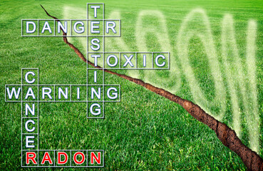 A green mowed lawn with a diagonal crack with radon gas escaping - concept image with crossword...