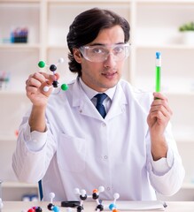 Young male scientist working in the lab