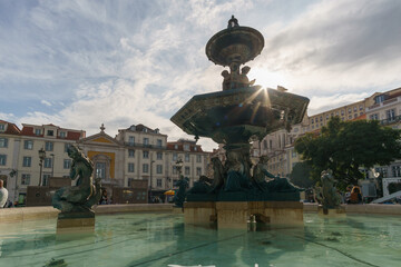 View of Fonte Sul do Rossio Fountain at Plaza Dom Pedro IV in the city center of Lisbon, Portugal