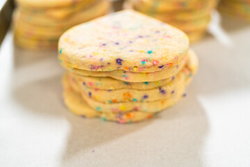 Packing Sprinkle-Adorned Sugar Cookies into Boxes