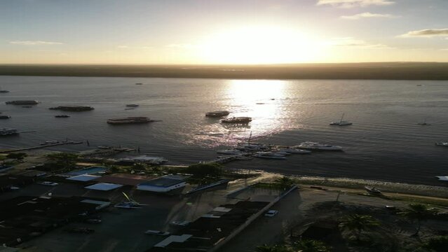 P&ocirc;r do Sol praia fluvial do Jacar&eacute;, Cabedelo.