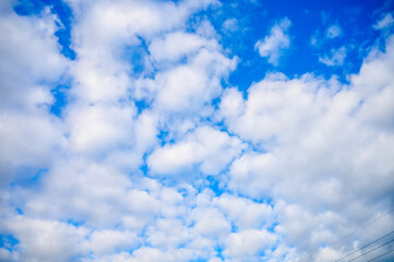 Blue sky and white clouds.white fluffy clouds in the blue sky